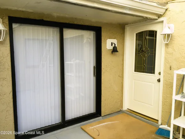 a view of a front door of the house