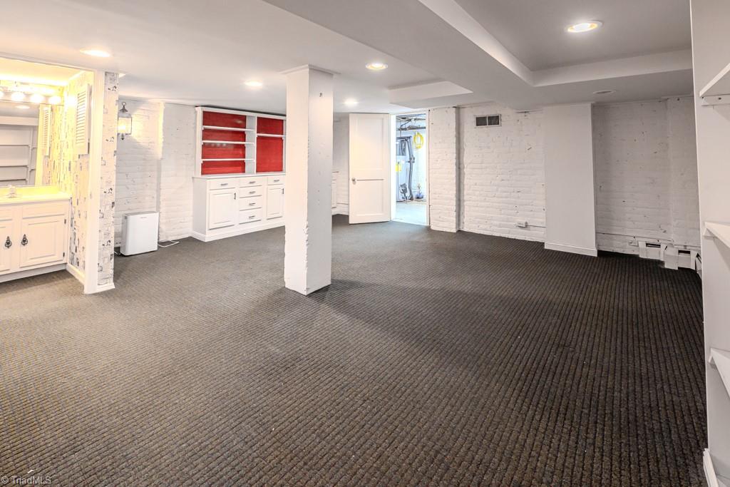 1700 Virginia Road Winston-Salem, NC 27104 - Photo 26 of 36 Large playroom with full bath downstairs.