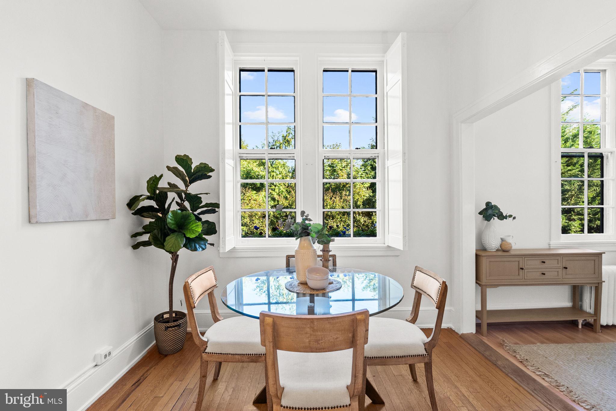 3039 Macomb Street Northwest, Unit 35 Washington, DC 20008 - Photo 16 of 50 Dining with huge windows and shutters