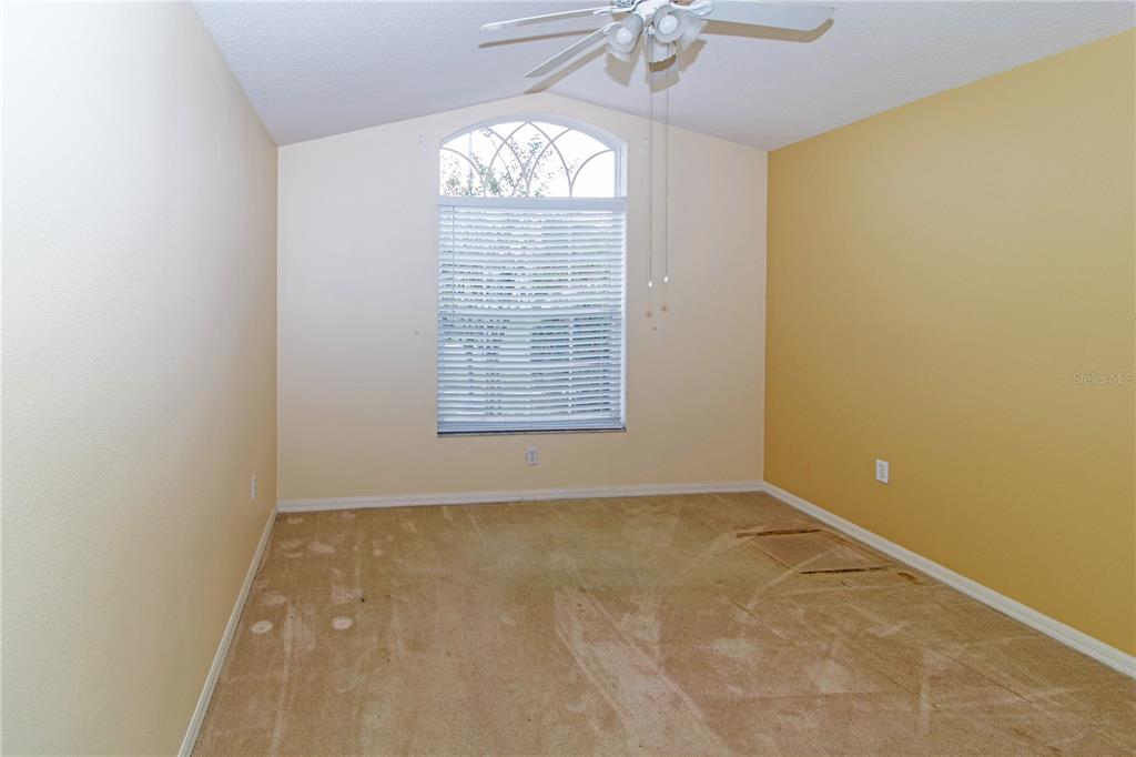1747 Ravenridge Street Wesley Chapel, FL 33543 - Photo 4 of 35 an empty room with windows