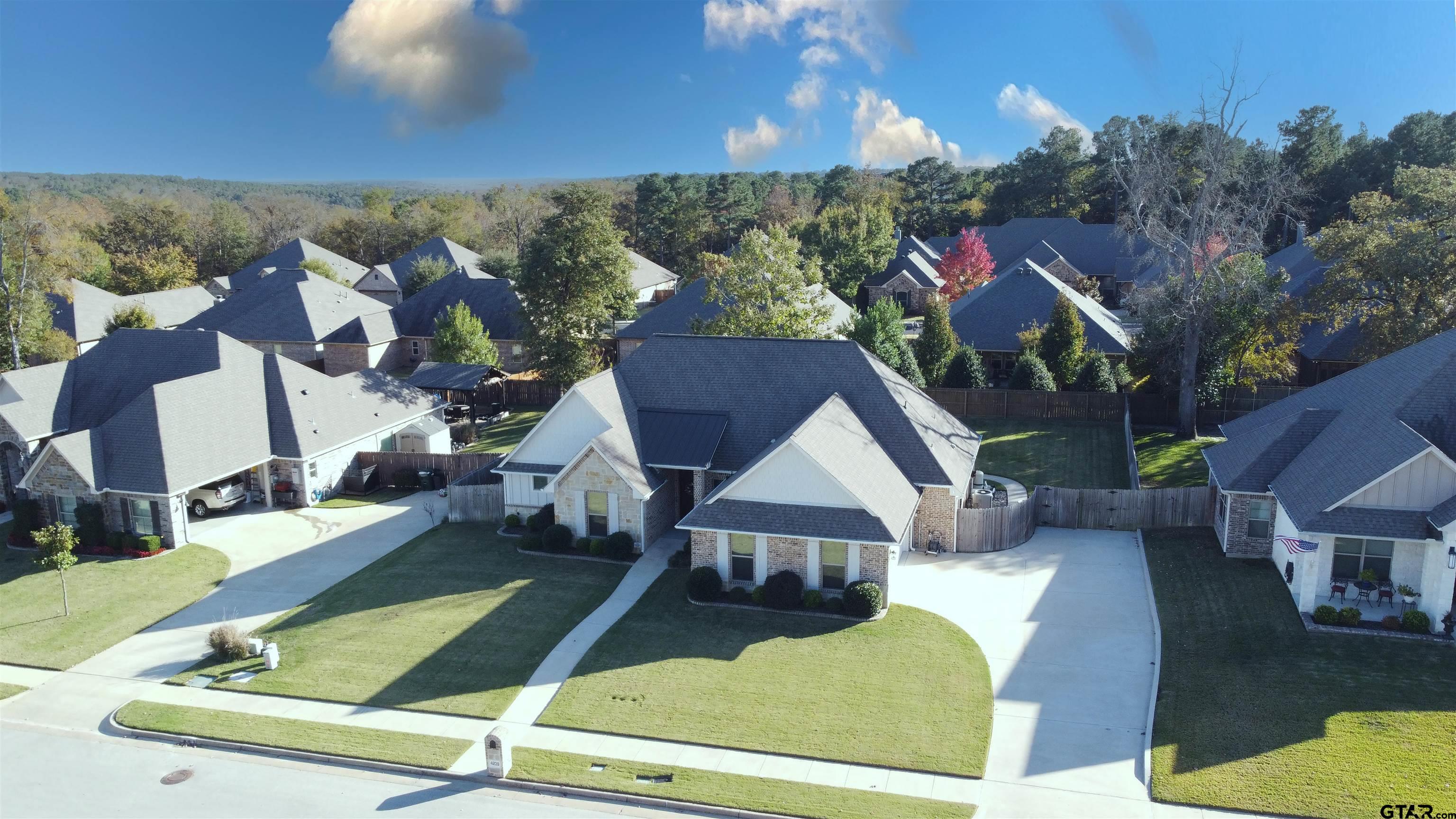 4239 Chapel Ridge Tyler, TX 75707 - Photo 1 of 1 an aerial view of house with yard