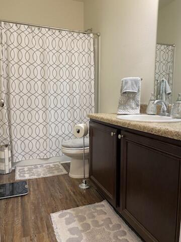 329 Merlin Court Crestview, FL 32539 - Photo 19 of 35 a bathroom with a granite countertop toilet and a sink