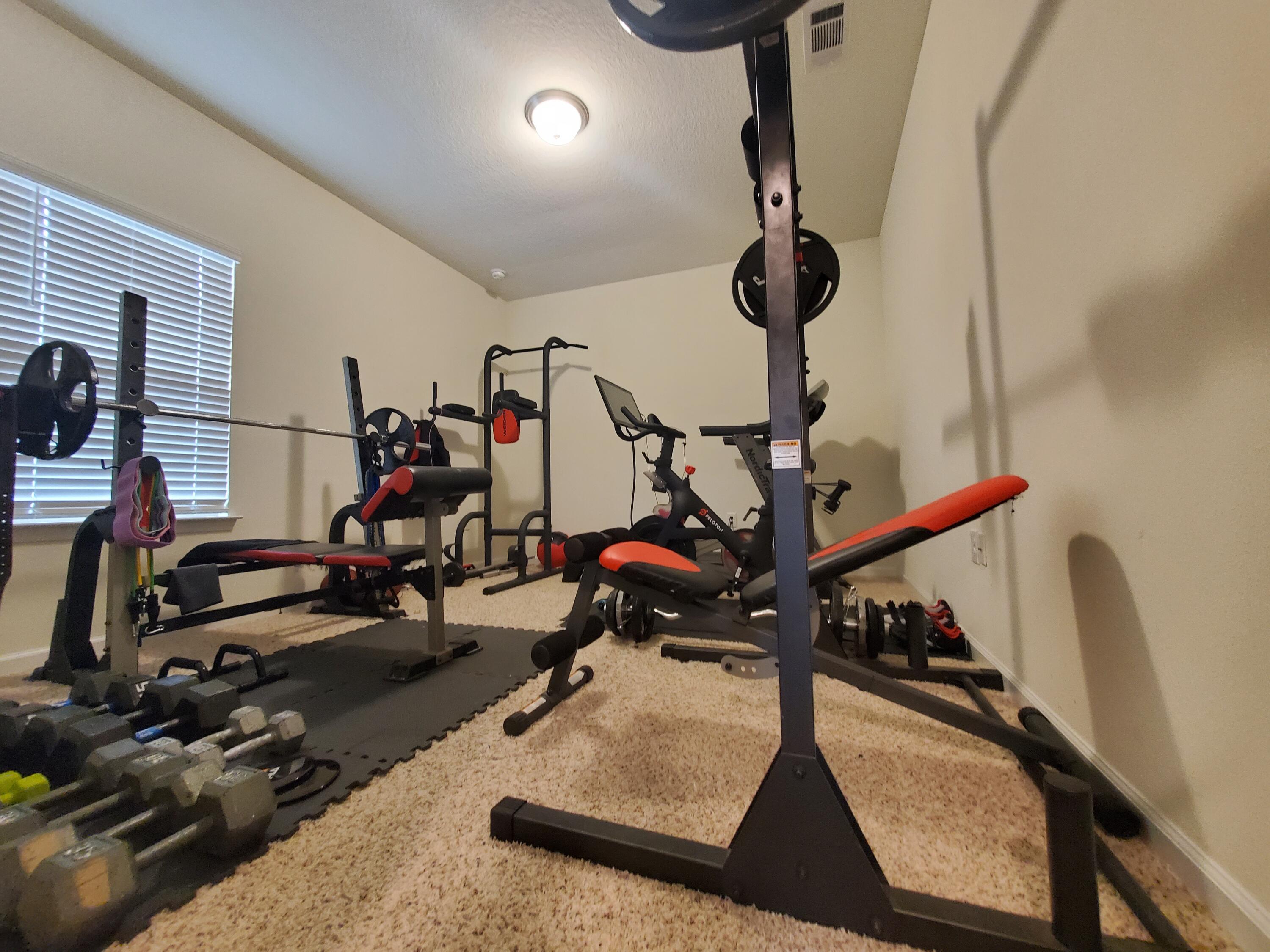 329 Merlin Court Crestview, FL 32539 - Photo 22 of 35 a room with gym equipment