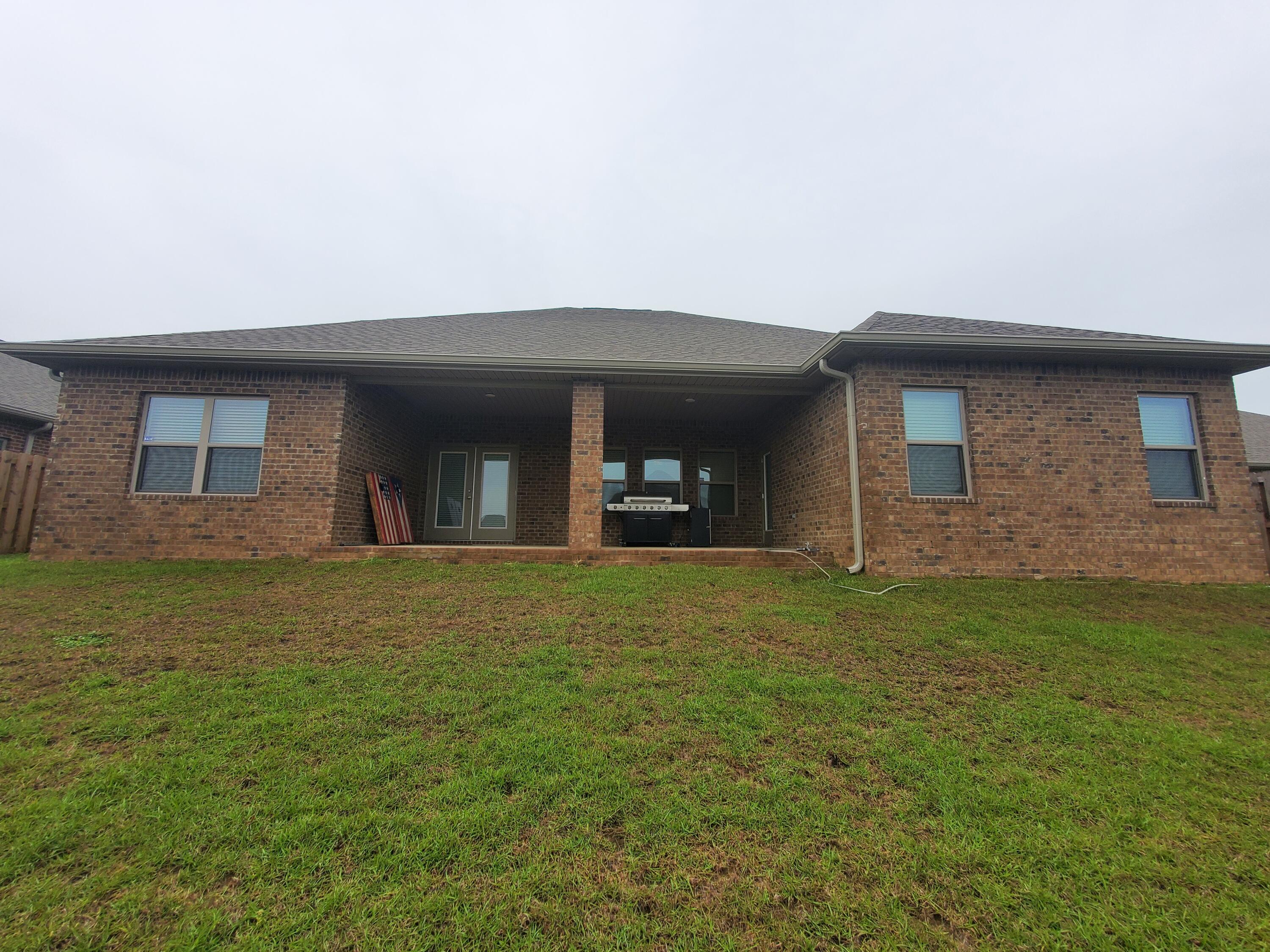 329 Merlin Court Crestview, FL 32539 - Photo 29 of 35 a front view of a house with a garden