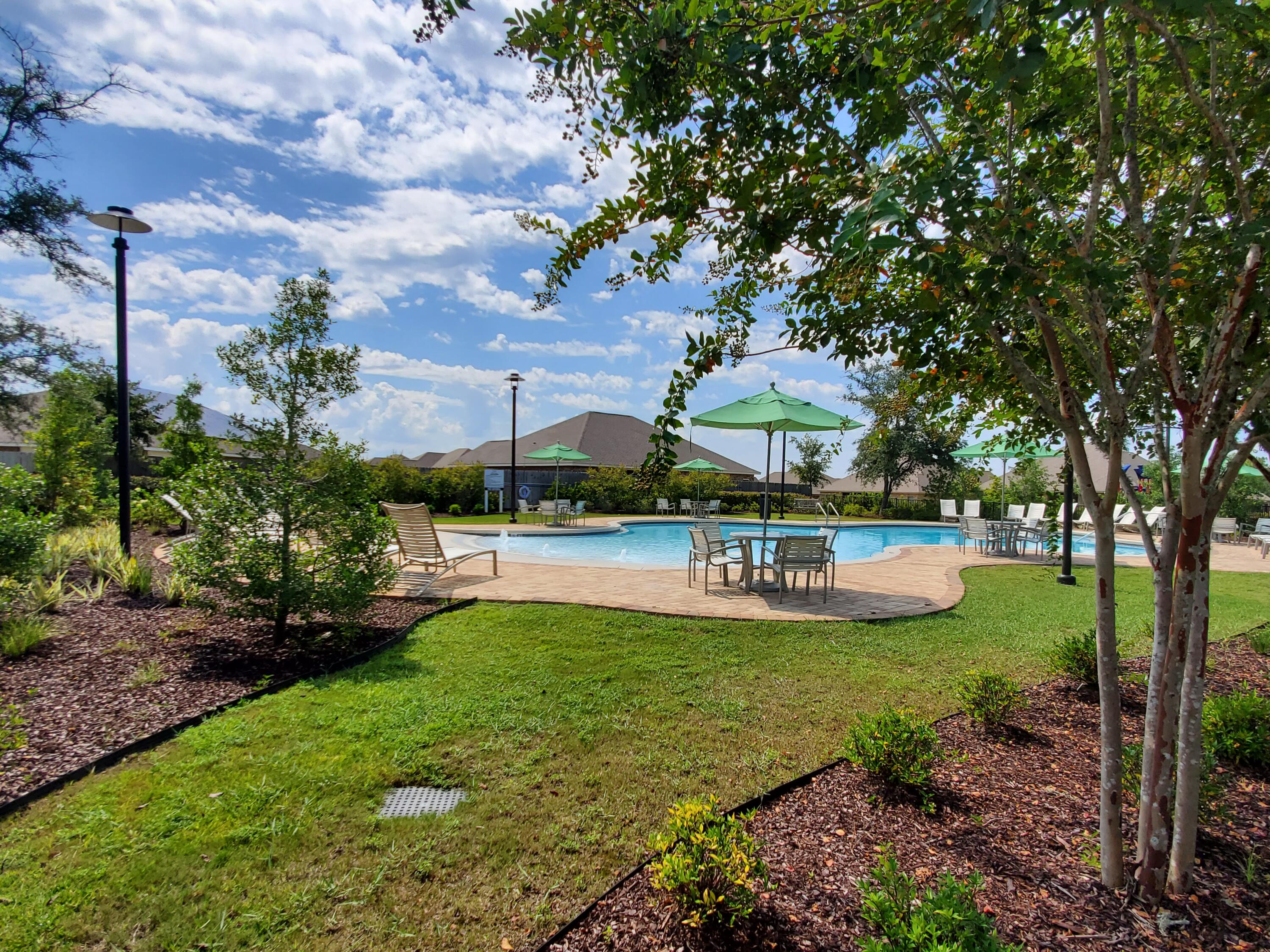 329 Merlin Court Crestview, FL 32539 - Photo 35 of 35 a view of a swimming pool and a yard
