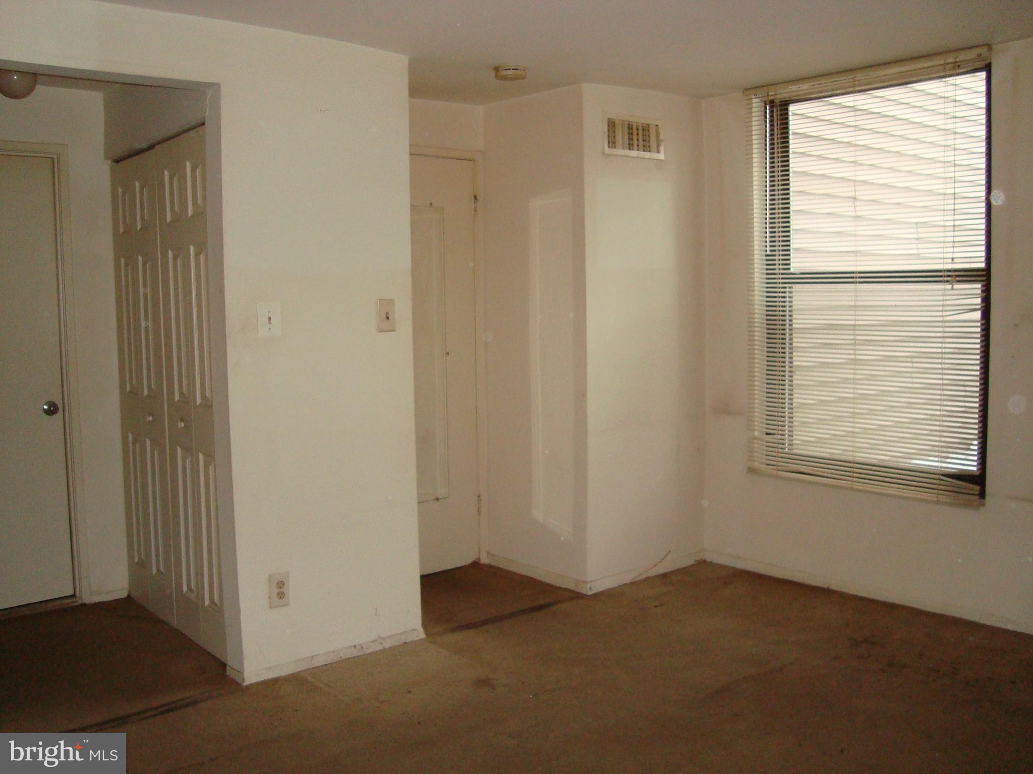 130 Duvall Lane, Unit 187T3 Gaithersburg, MD 20877 - Photo 16 of 19 a view of an empty room with a window