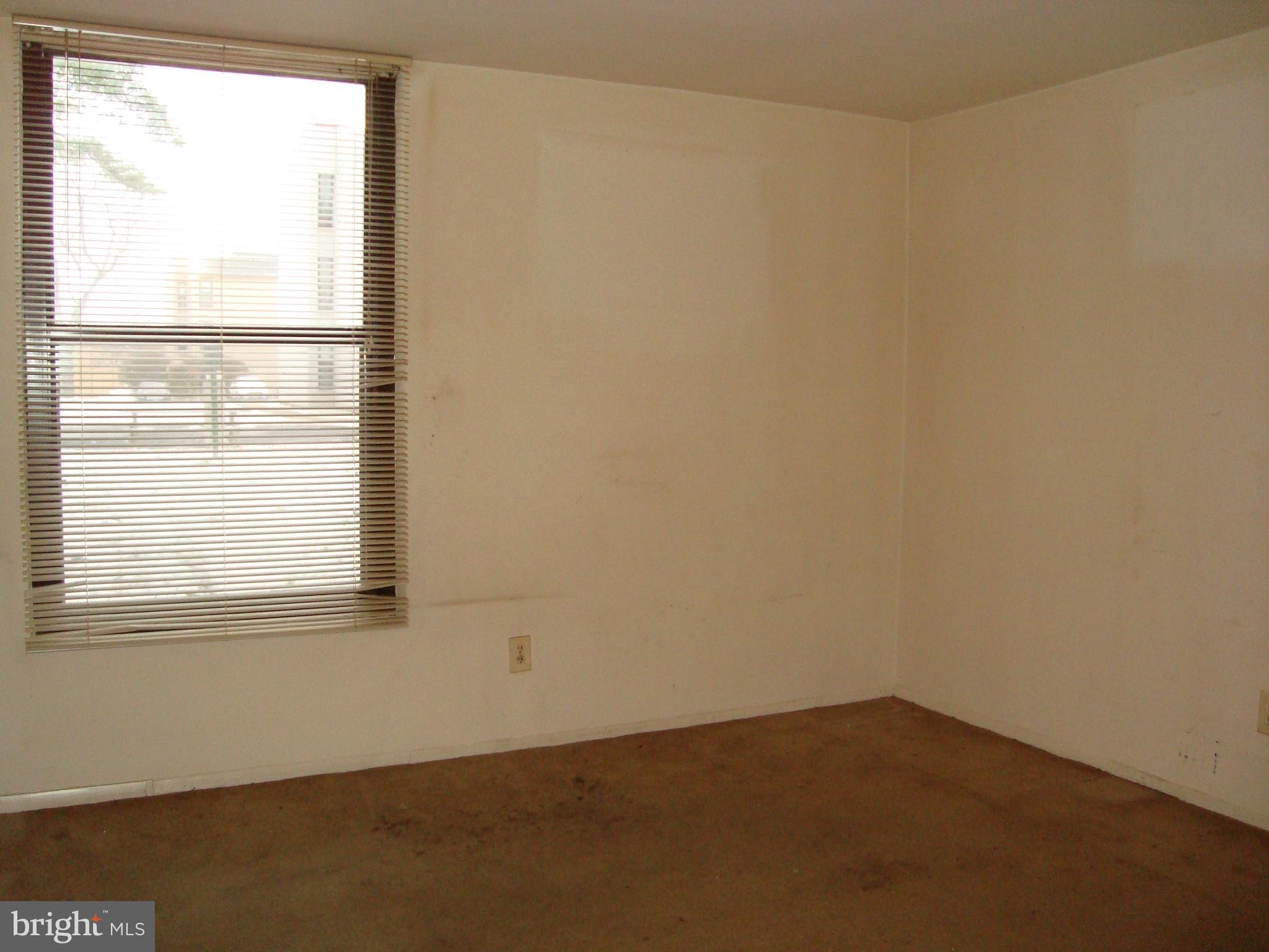130 Duvall Lane, Unit 187T3 Gaithersburg, MD 20877 - Photo 18 of 19 an empty room with a window