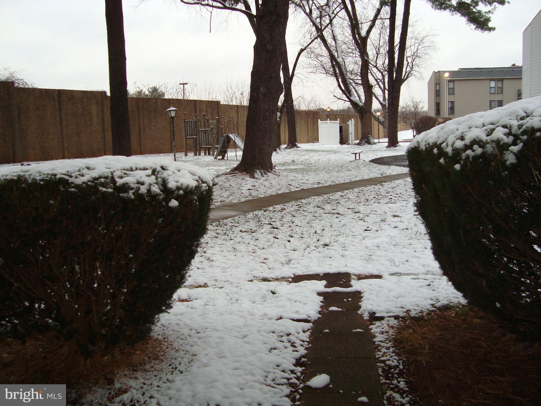 130 Duvall Lane, Unit 187T3 Gaithersburg, MD 20877 - Photo 19 of 19 a view of a backyard of the house