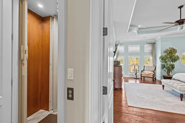 a bedroom with a bed and flat screen tv