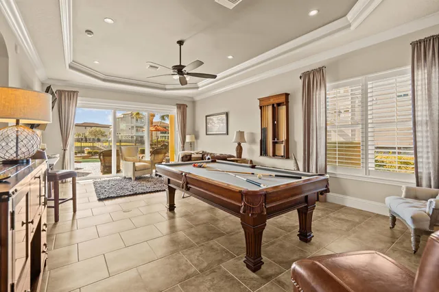 a room with furniture a window and a chandelier