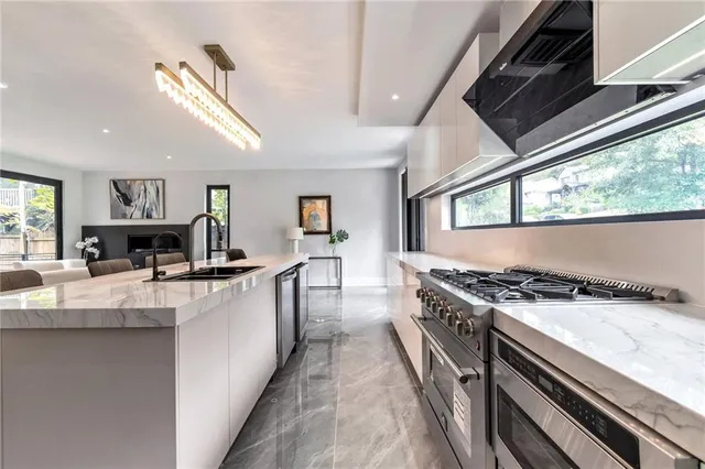 a kitchen with a stove and a sink