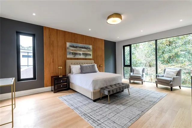 a bedroom with a bed and furniture