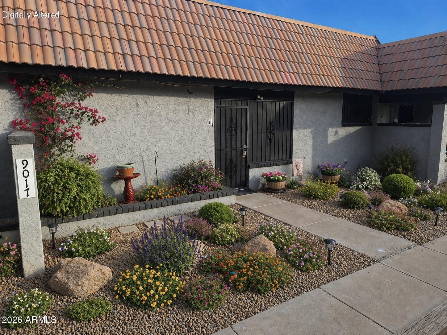 9017 West Elm Street, Unit 6 Phoenix, AZ 85037 - Photo 1 of 21 Front Virtually Staged