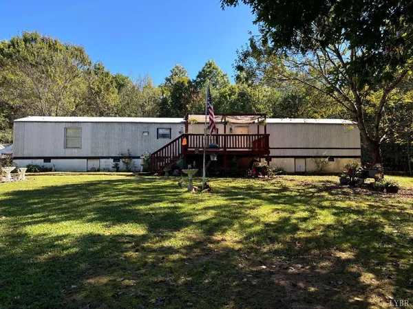 a view of a house with a big yard
