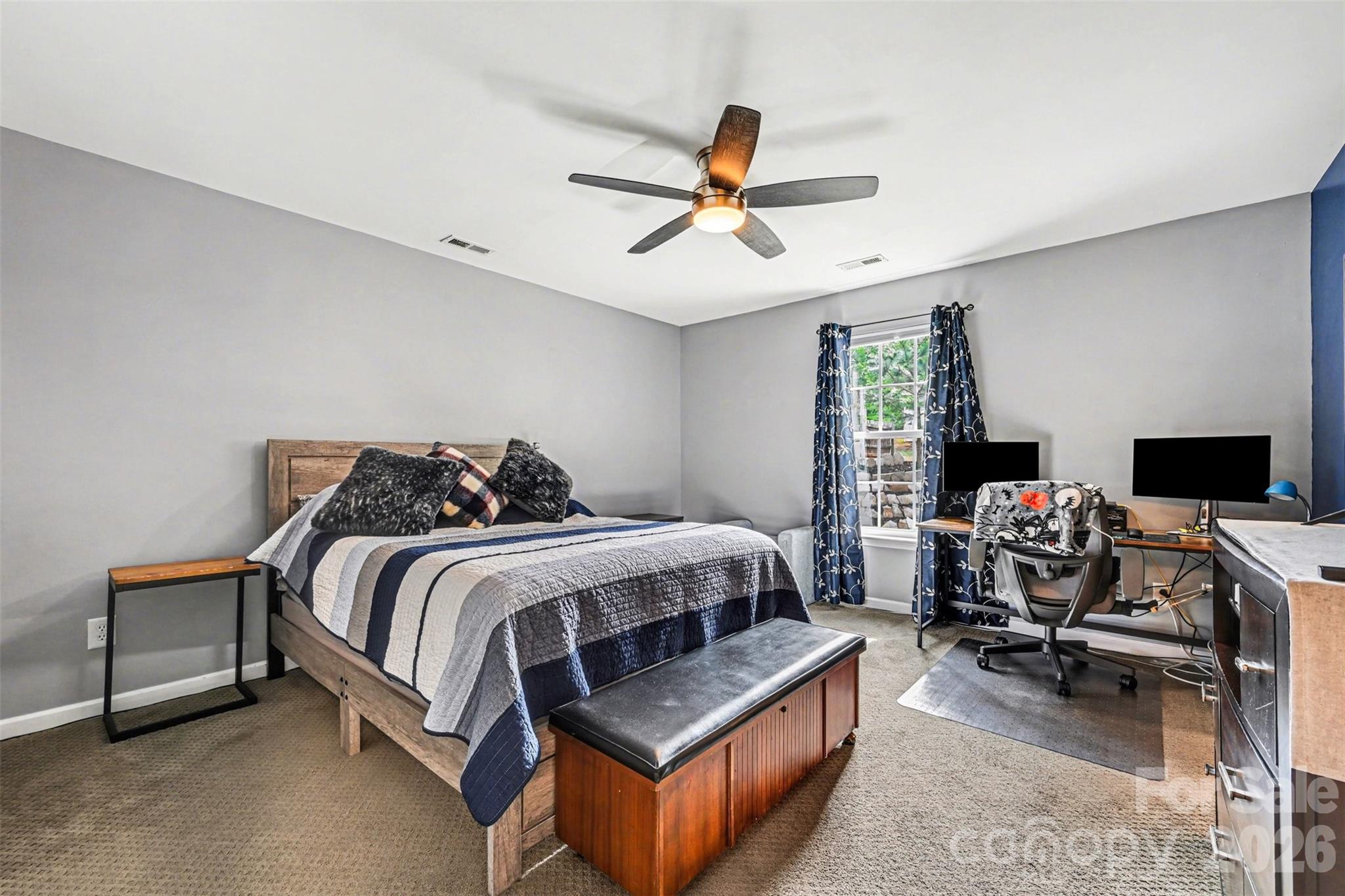 391 Lone Tree Lane Clover, SC 29710 - Photo 11 of 27 a bedroom with bed and a flat screen tv