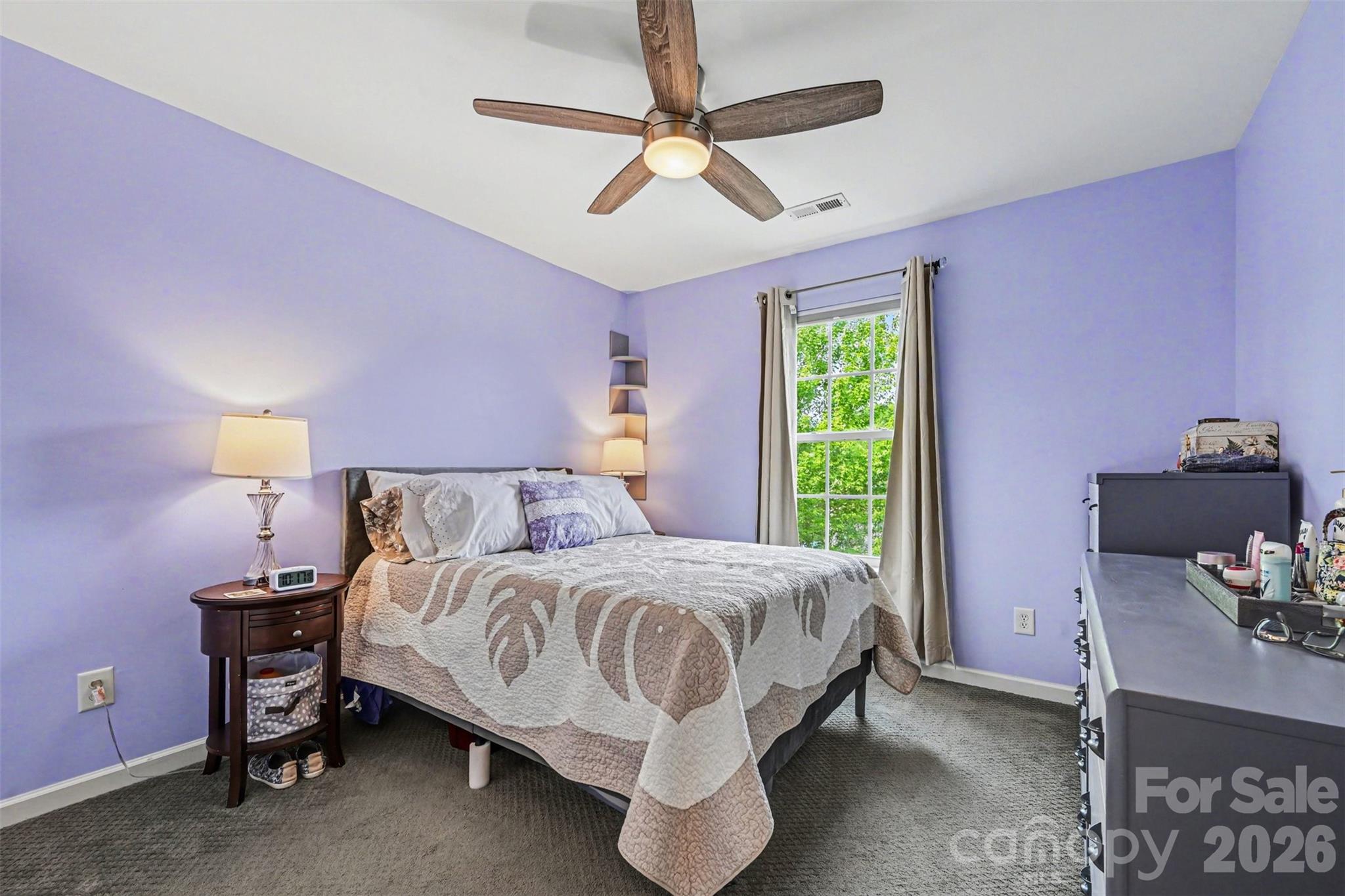 391 Lone Tree Lane Clover, SC 29710 - Photo 16 of 27 a bedroom with a bed and a window