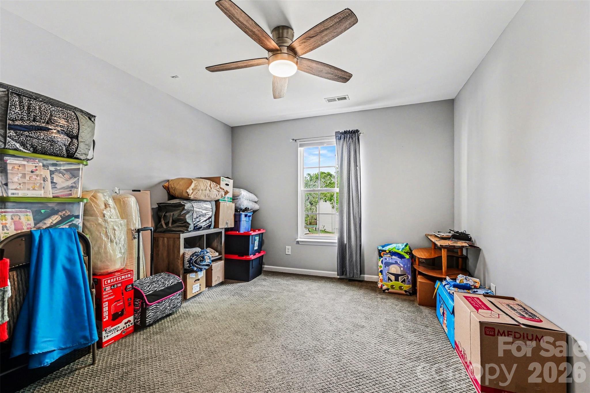 391 Lone Tree Lane Clover, SC 29710 - Photo 23 of 27 a children room with toys and a fan