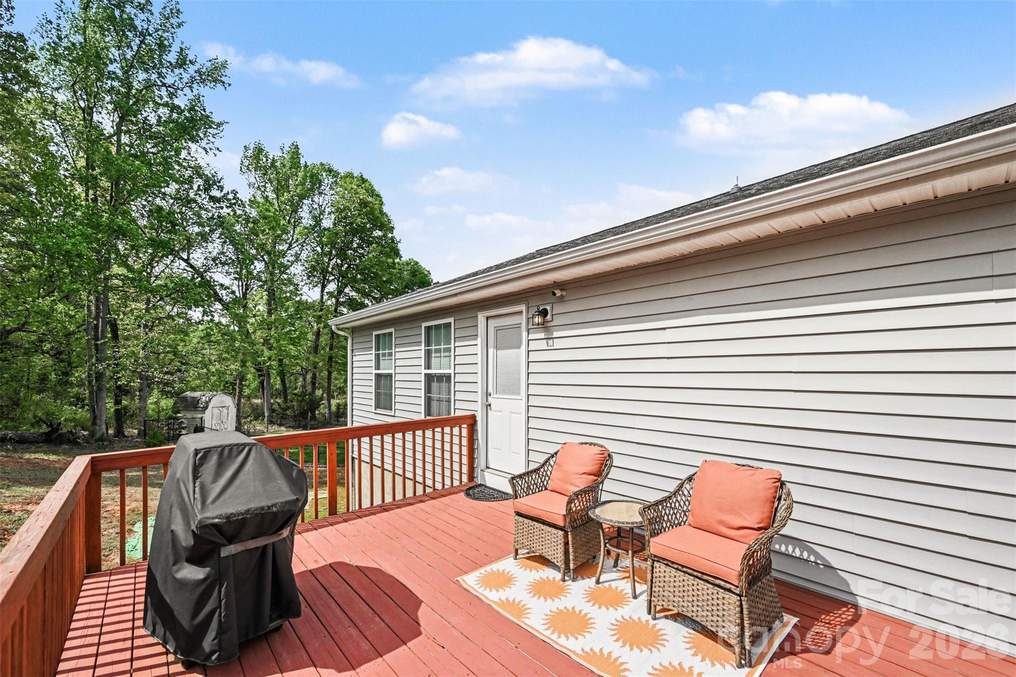 391 Lone Tree Lane Clover, SC 29710 - Photo 25 of 27 a view of a chairs on the deck
