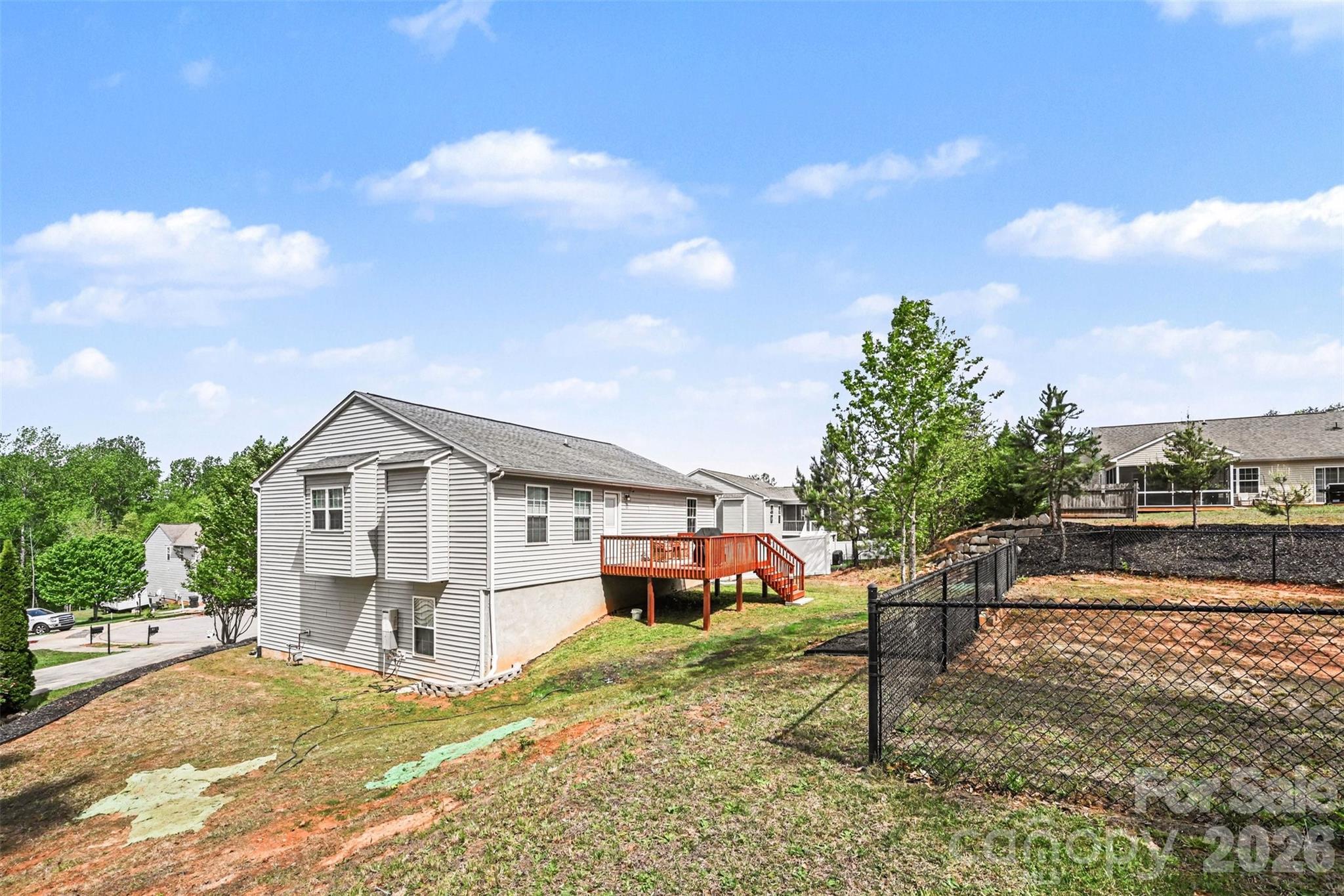 391 Lone Tree Lane Clover, SC 29710 - Photo 27 of 27 a view of a house with a wooden fence