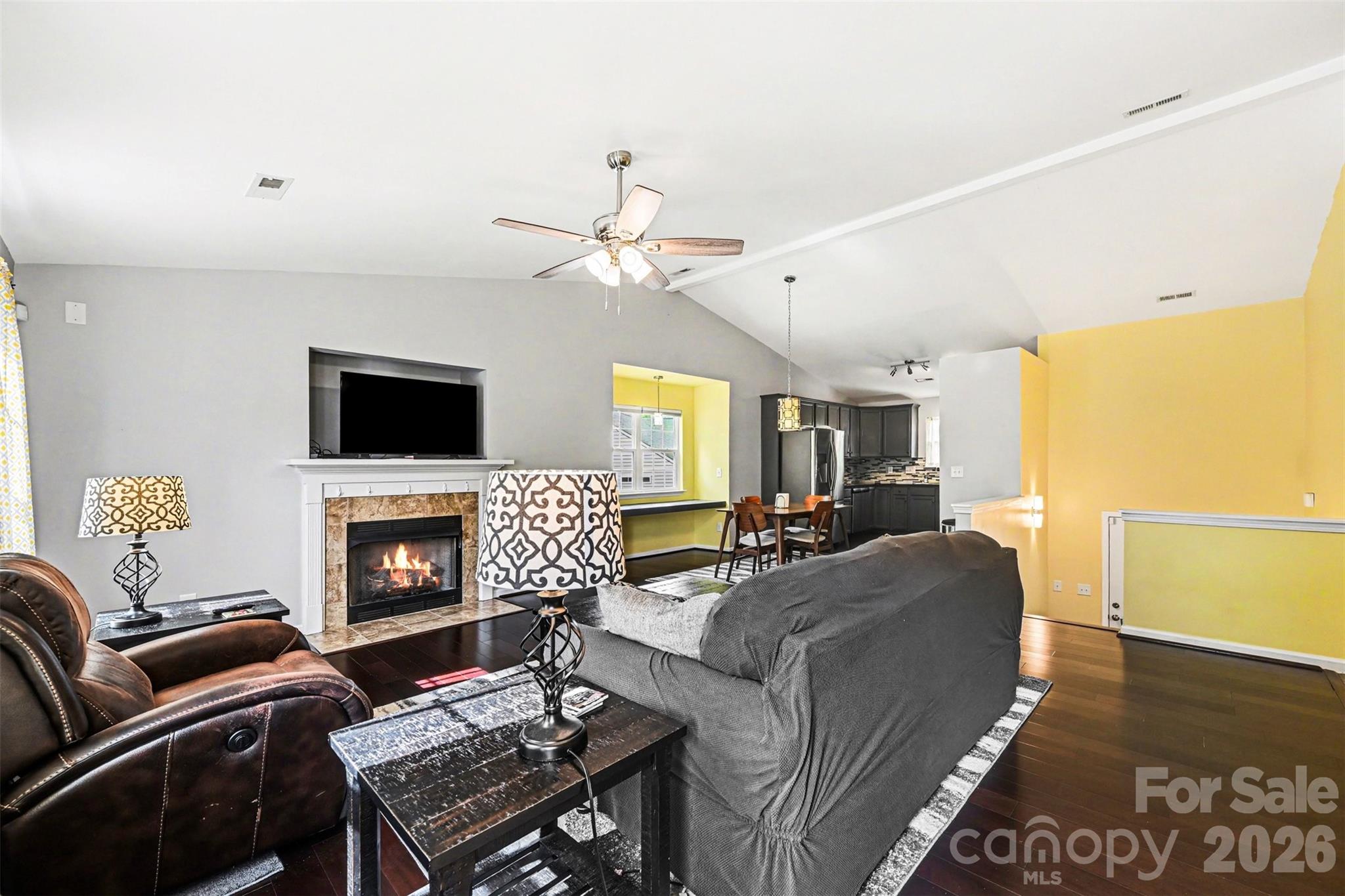 391 Lone Tree Lane Clover, SC 29710 - Photo 5 of 27 a living room with furniture flat screen tv and a fireplace