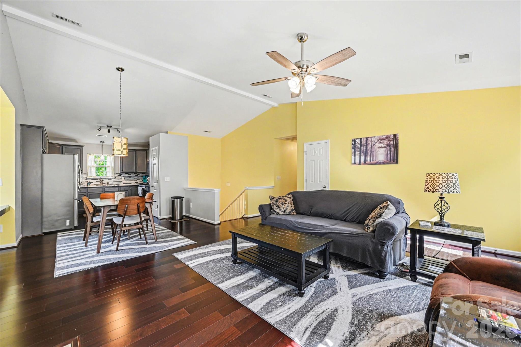 391 Lone Tree Lane Clover, SC 29710 - Photo 6 of 27 a living room with furniture and a chandelier
