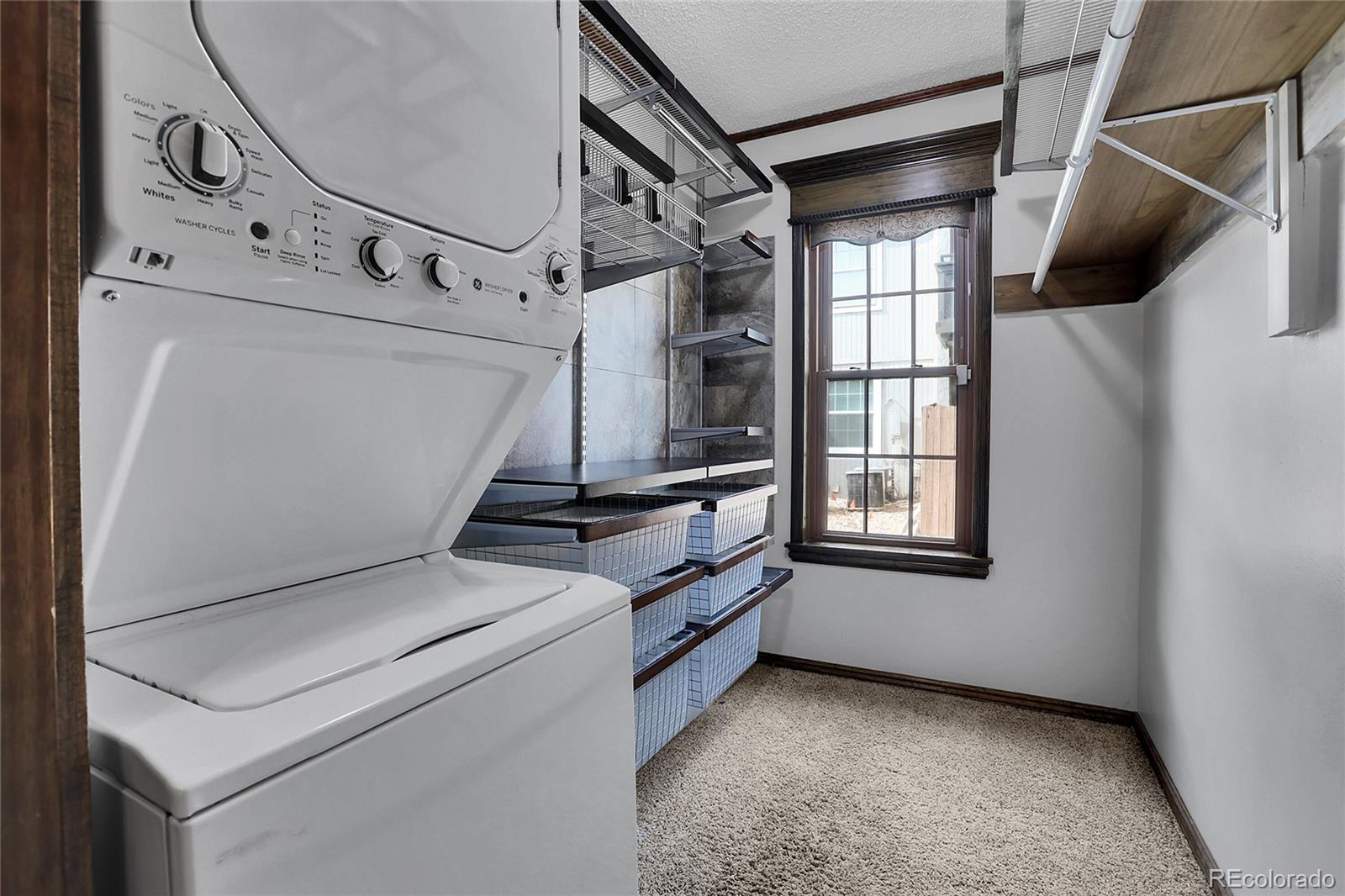 2301 East Fremont Avenue, Unit U05 Centennial, CO 80122 - Photo 18 of 33 a view of washer and dryer