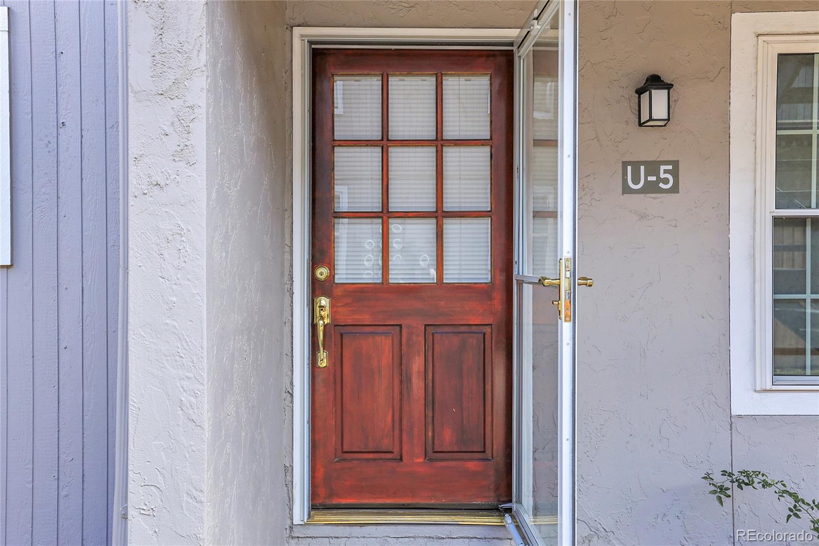 2301 East Fremont Avenue, Unit U05 Centennial, CO 80122 - Photo 3 of 33 a view of front door with a door