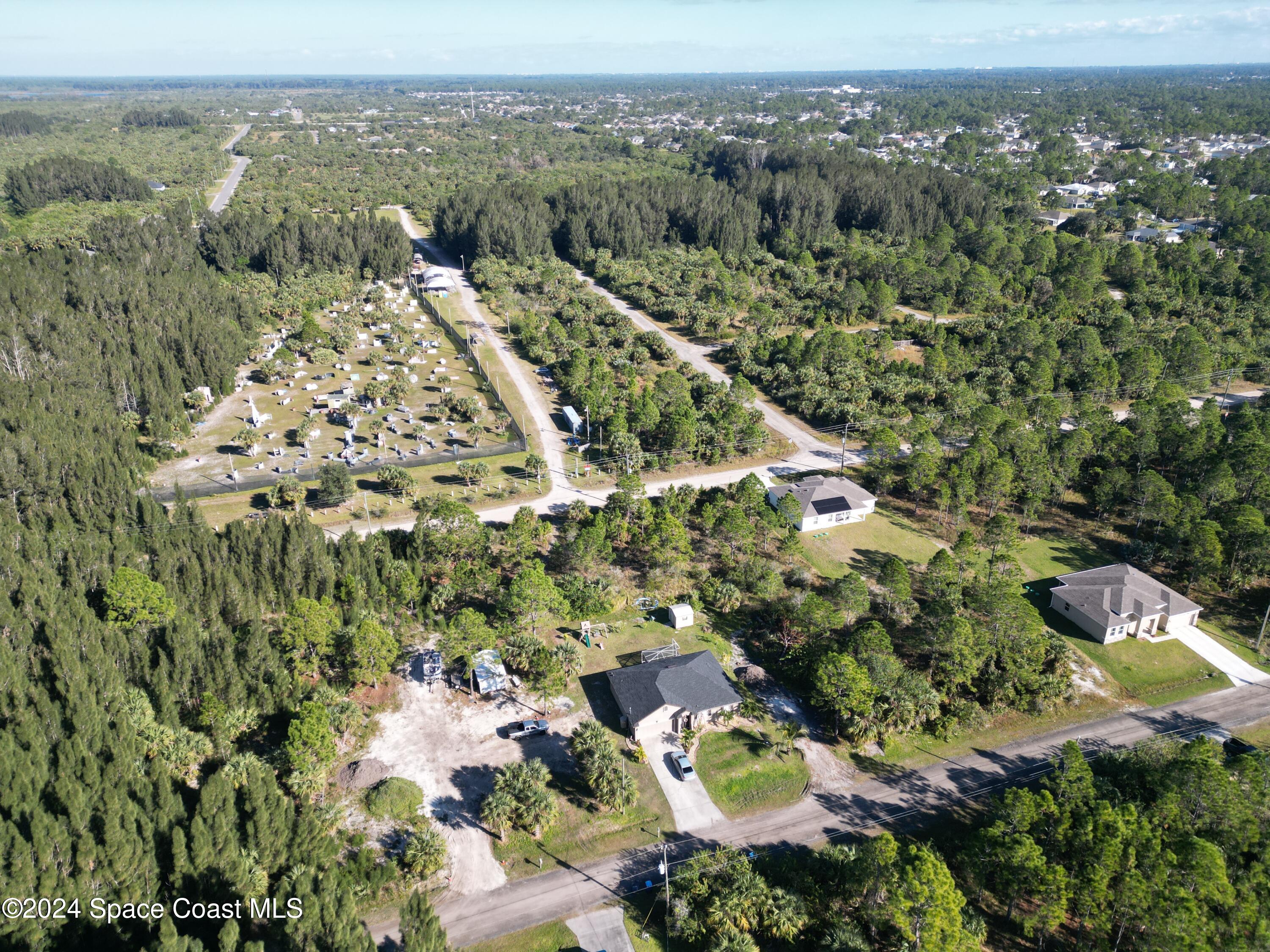 699 Laika Road Southwest Palm Bay, FL 32908 - Photo 8 of 10 Several newer homes already in the area