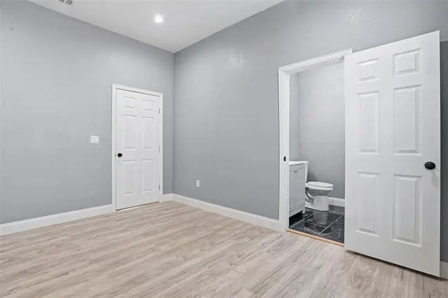 wooden floor and chair in a room