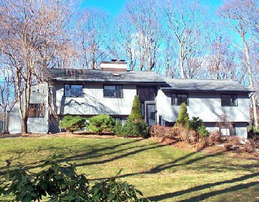 19 Pebble Road Newtown, CT 06470 - Photo 1 of 1 a view of a house with a yard and sitting area