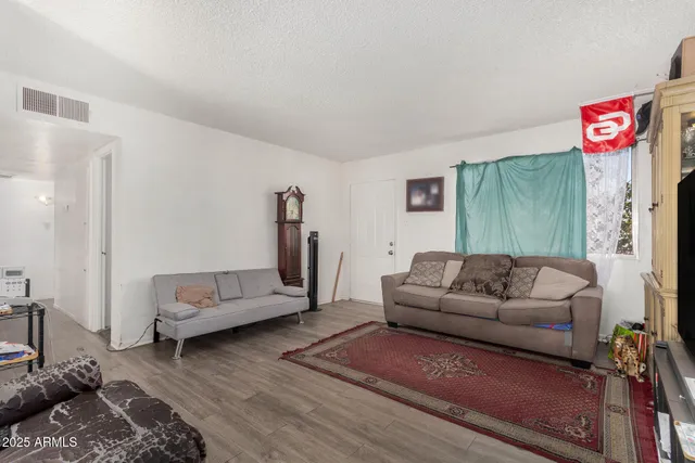 a living room with furniture and a couch