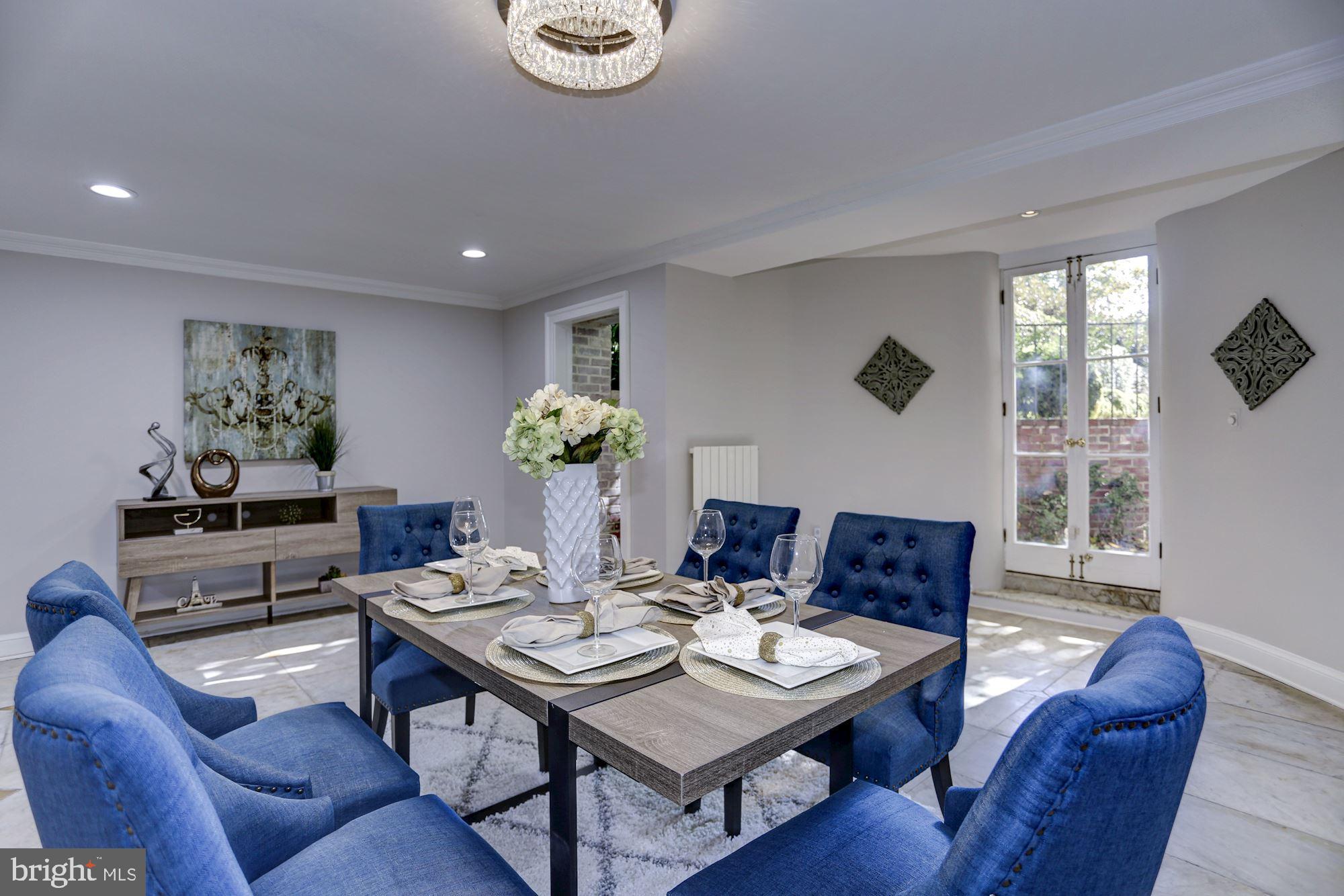 3306 R Street Northwest Washington, DC 20007 - Photo 17 of 23 Sunny dining room with marble floors.