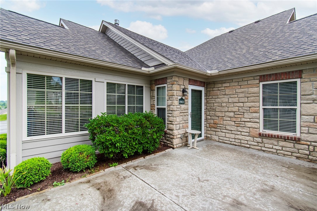 9151 Springfield Road, Unit 1902 Youngstown, OH 44514 - Photo 31 of 36 Property entrance featuring a patio area