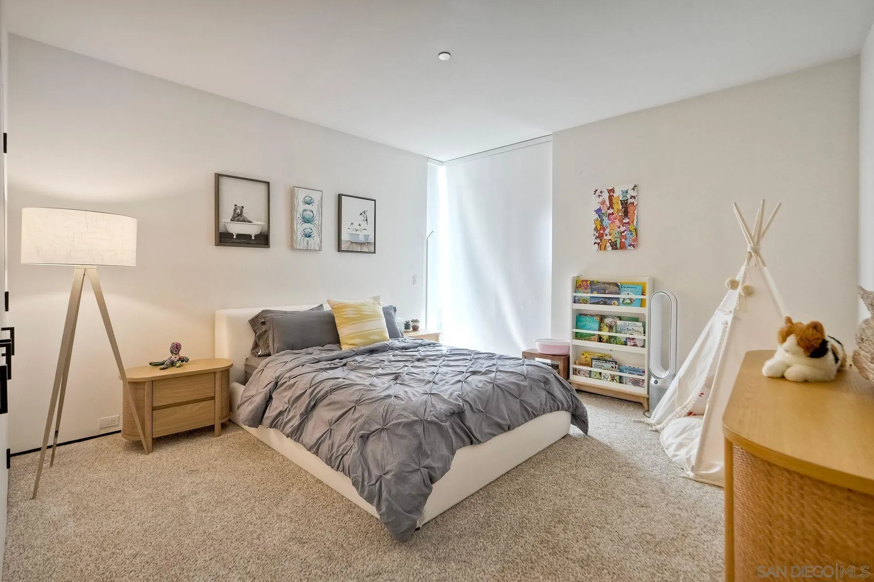 12911 Via Grimaldi Del Mar, CA 92014 - Photo 28 of 41 a bedroom with a bed and a couch