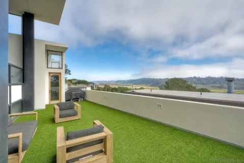 a view of a house with a garden