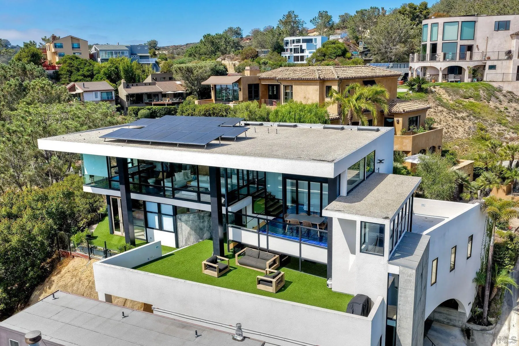12911 Via Grimaldi Del Mar, CA 92014 - Photo 3 of 41 a aerial view of a house with porch and furniture