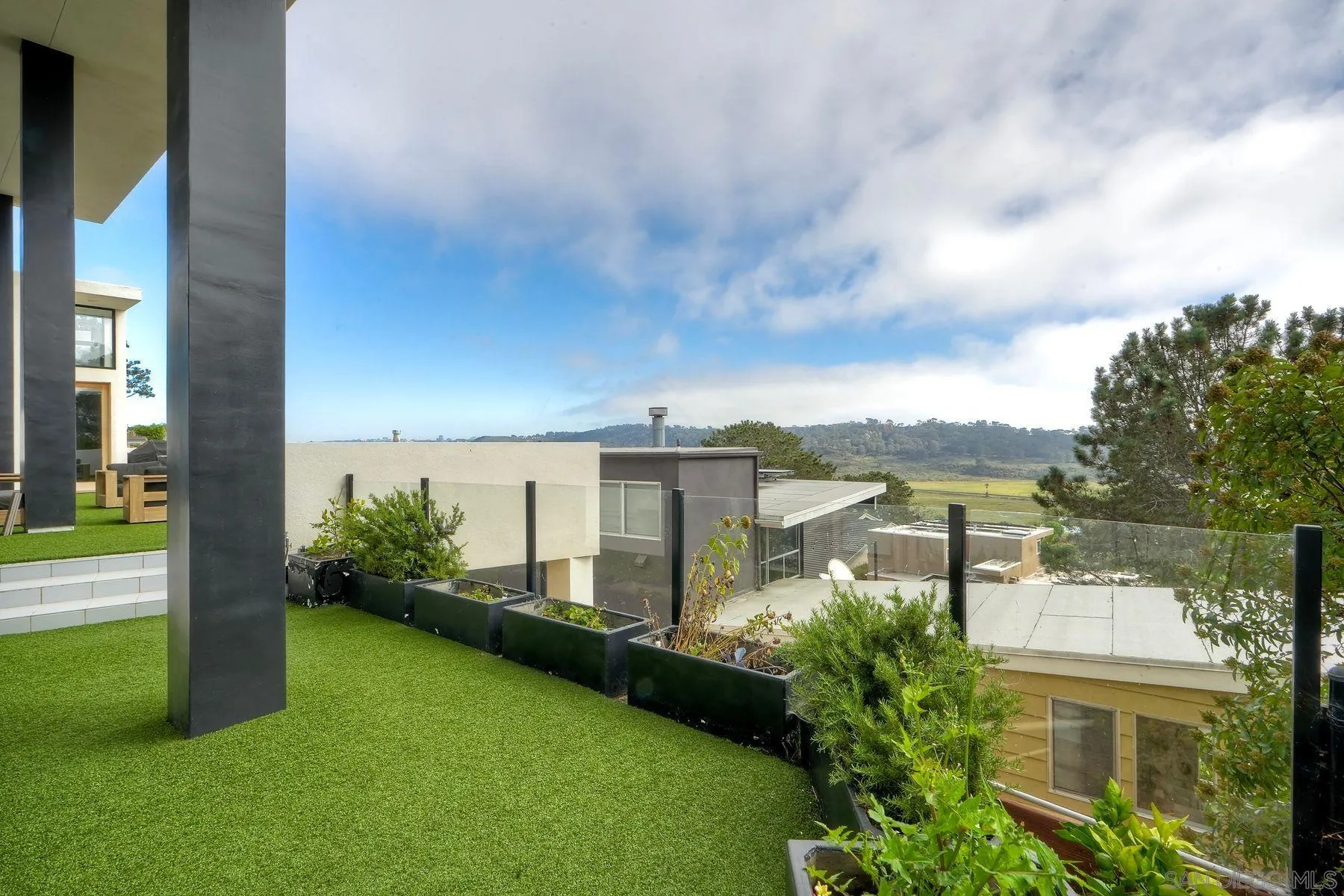 12911 Via Grimaldi Del Mar, CA 92014 - Photo 31 of 41 a view of a house with a garden