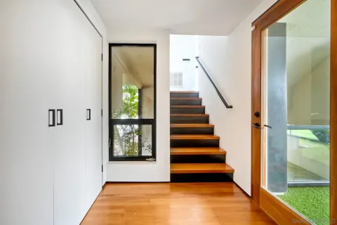 a view of a bathroom from a hallway