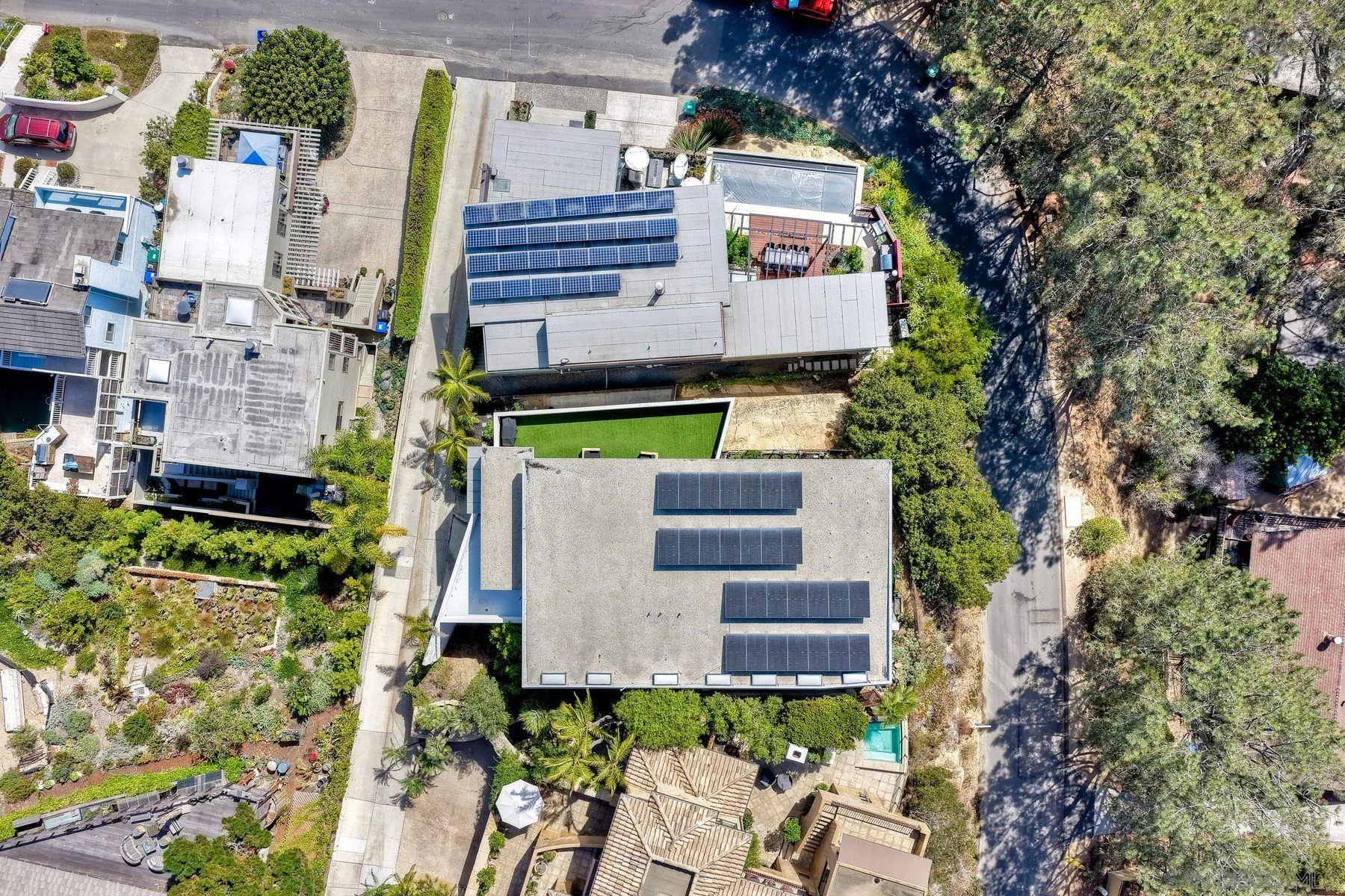 12911 Via Grimaldi Del Mar, CA 92014 - Photo 38 of 41 an aerial view of a house with a yard and garden