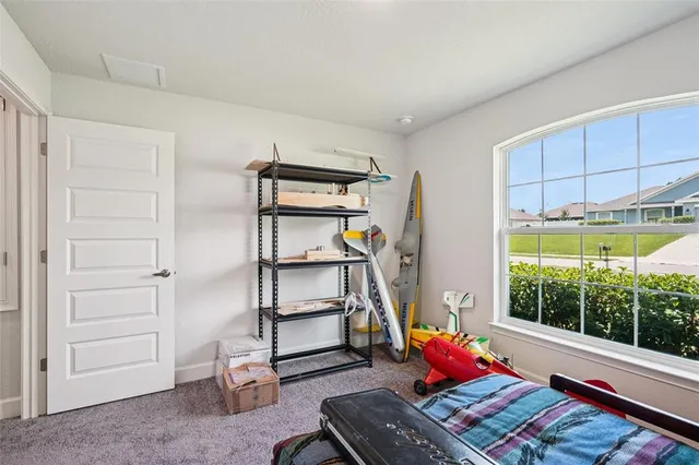 a bathroom with a granite countertop sink toilet tub and shower