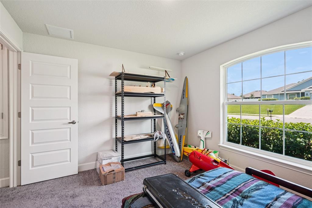 67 Northwest 45th Loop Ocala, FL 34475 - Photo 20 of 27 a living room with furniture and a window