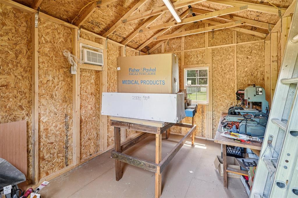 67 Northwest 45th Loop Ocala, FL 34475 - Photo 26 of 27 a view of a room with many windows