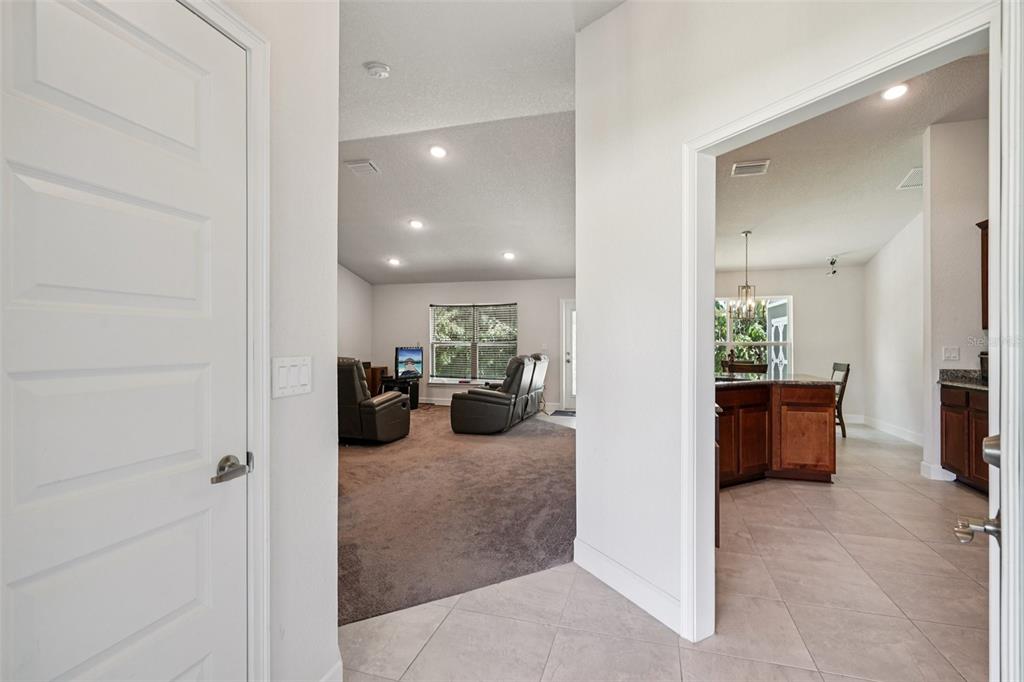 67 Northwest 45th Loop Ocala, FL 34475 - Photo 8 of 27 a view of a living room and a couch