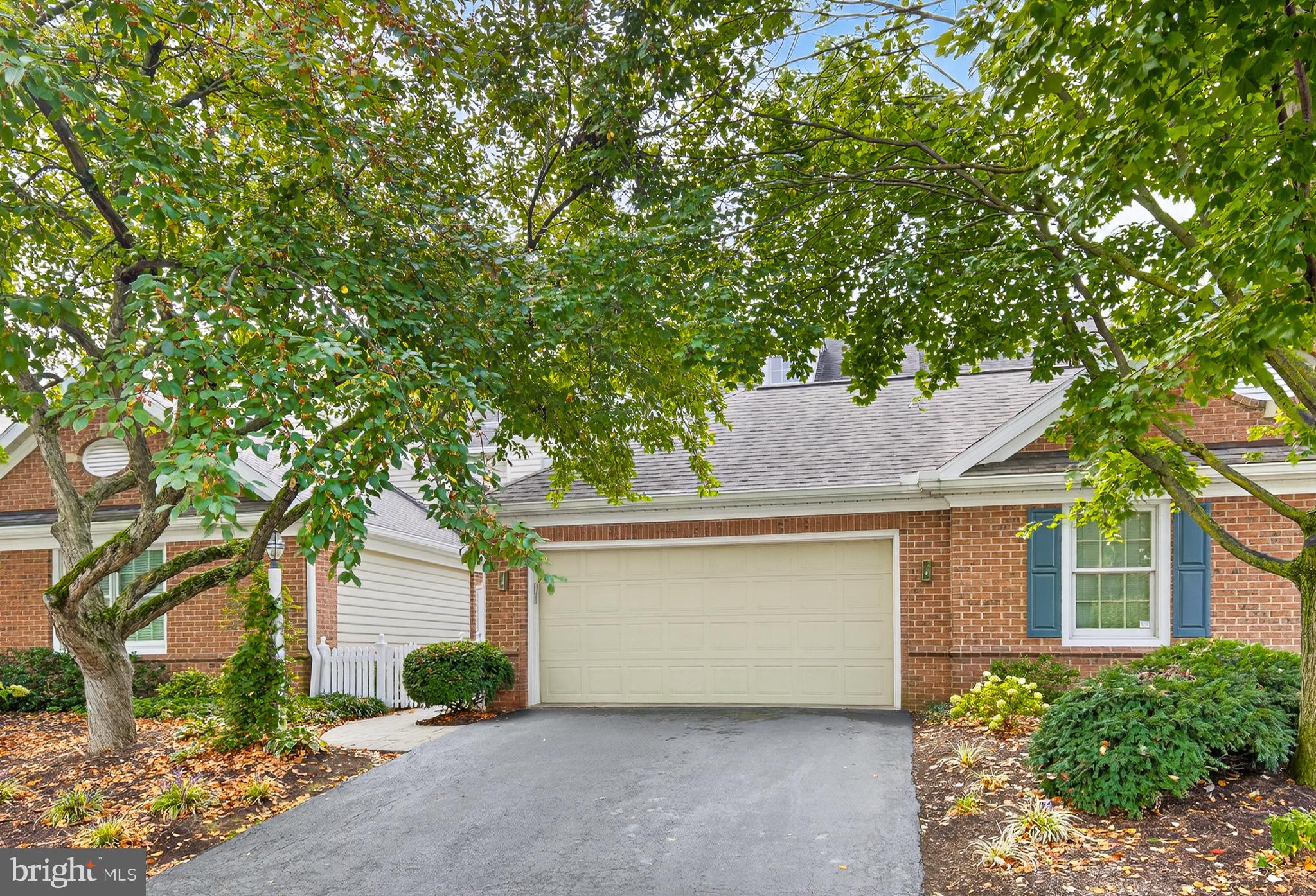 634 Northfield Road Lititz, PA 17543 - Photo 2 of 34 front view of a house with a tree