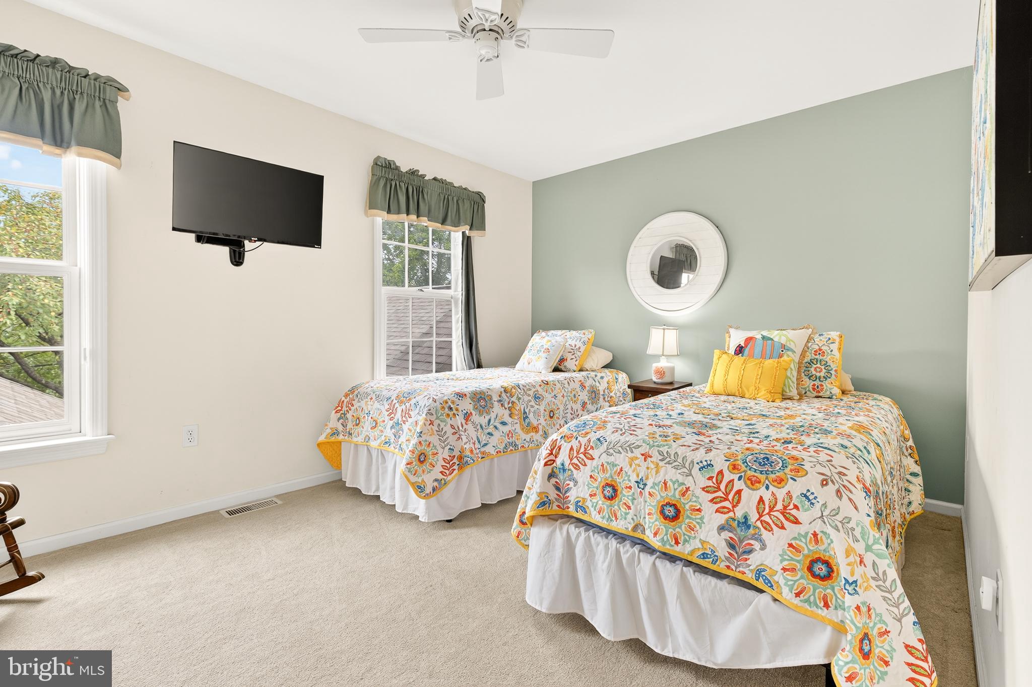 634 Northfield Road Lititz, PA 17543 - Photo 24 of 34 a bedroom with two beds and a flat screen tv