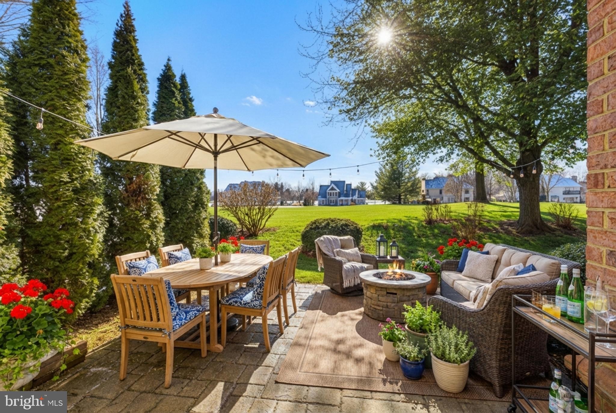 634 Northfield Road Lititz, PA 17543 - Photo 26 of 34 a view of a patio with furniture and a fire pit