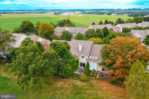 an aerial view of ocean with residential house with outdoor space and lake view