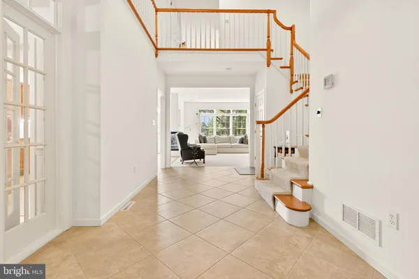 a view of a living room and entry way
