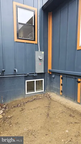 a view of a living room with a large window