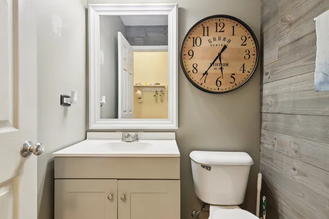 a bathroom with a toilet and a sink